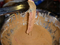 Dipping Bacon in Batter Picture