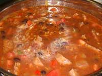 Hot and Spicy, Dirty Rice, Cooking the Rice with the Broth Picture