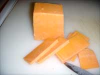 Slicing tyhe Cheese for the Soup Picture