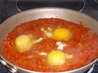 Poaching the Eggs in Sasuce Picture