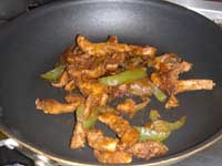 Warming the leftover chicken Picture