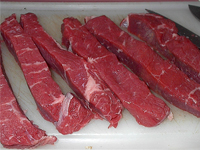 Slicing the Meat for Kebabs Picture