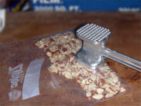 Picture of Crushing the Almonds for my Orange Jerked,  Wahoo Almondine Recipe