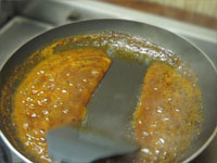 Reducing Orange Sauce for Pecan Crusted Mahi-Mahi Picture