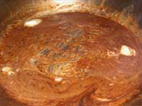 Pork Tenderloin Mignonettes, Melting the Butter into the Pan Sauce Picture