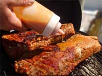 Smoked, Pork Loin, Adding Sauce to the Smoking Pork Picture
