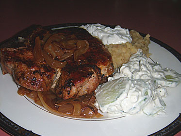 Grilled Pork Steaks, with Onion Soup Mashed Potatoes, and Blue Cheese Cucmbers and Sour Cream Picture