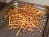 Shoe String Potatoes, Draining and Seasoning the Fries Picture